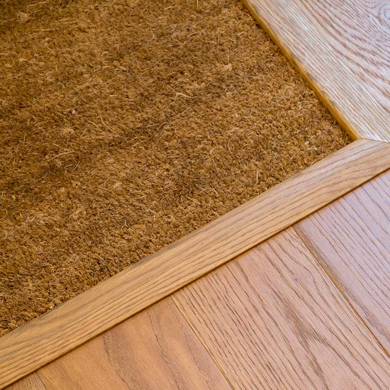 Transition from coir doormat to wooden floor